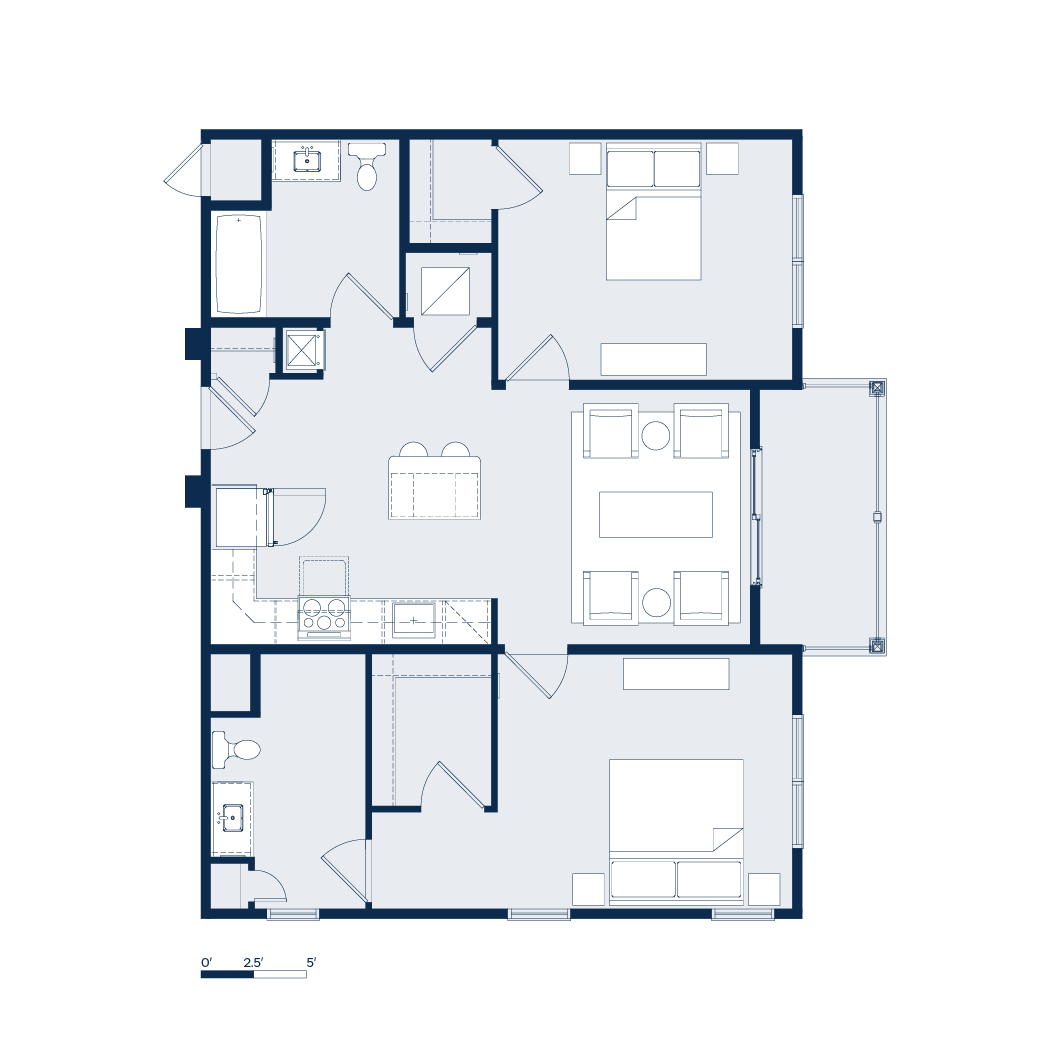 Floor plan of a home with two bedrooms, a kitchen, living area, and a small outdoor patio.