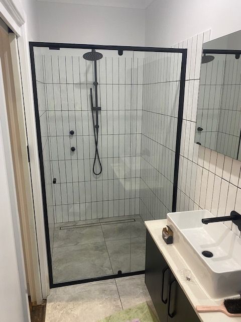 Semi Frameless Pivoting Shower Screen 1 — Patterson Glass Works in Kempsey, NSW