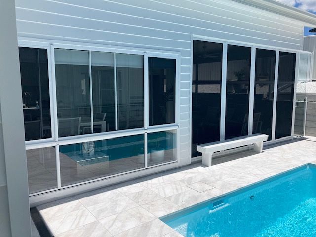 Solar film on windows with the pool— Patterson Glass Works in Kempsey, NSW