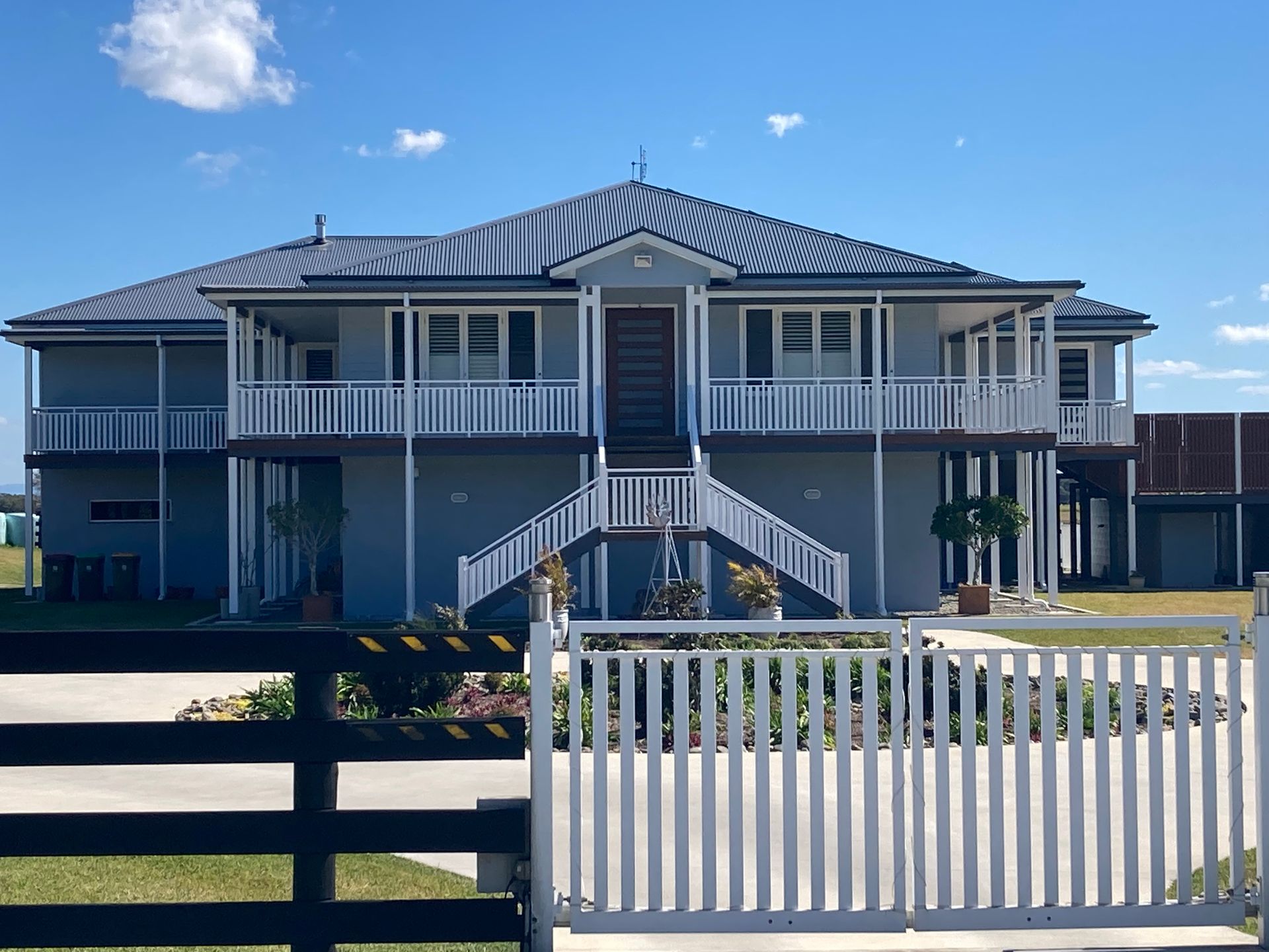 A Large Piece of Glass is Being Lifted by a Crane — Patterson Glass Works in Kempsey, NSW