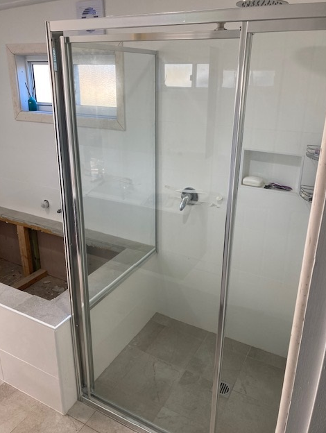 Fully Framed Pivotal Door 3 — Patterson Glass Works in Kempsey, NSW