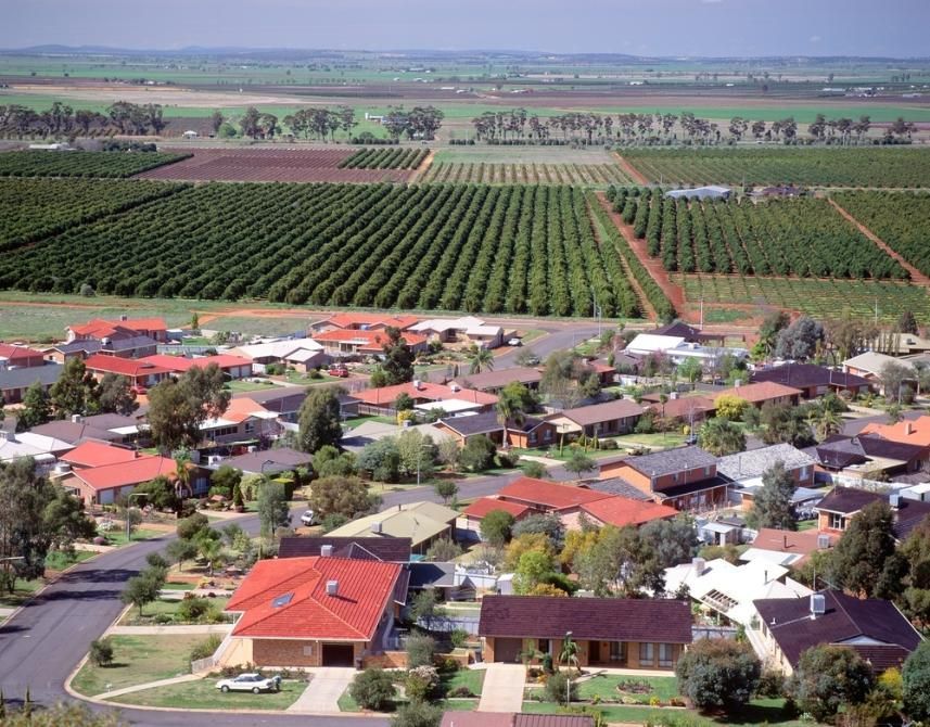 An Aerial View of a Residential Area Surrounded by Fields — Patterson Glass Works in Frederickton, NSW