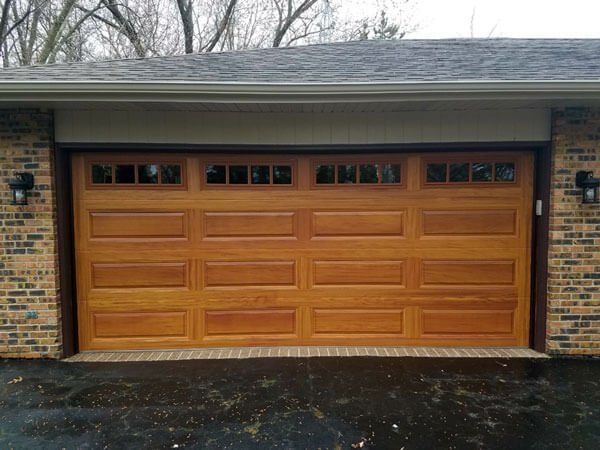 Wood Paneled Garage Door — Big Rock, IL | J&D Door Sales Inc.