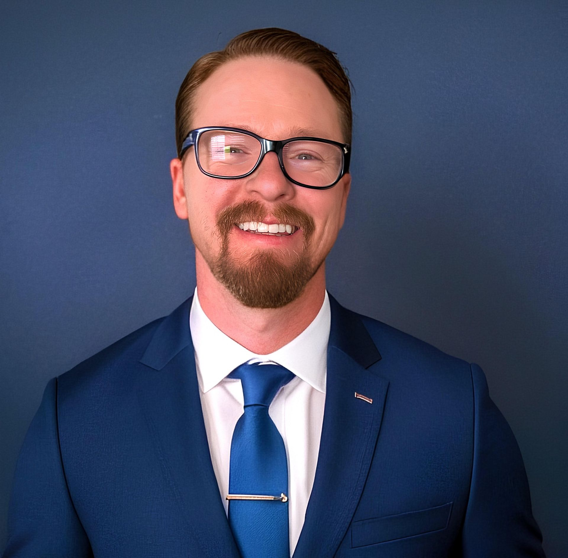 Two people shaking hands, signifying a deal or agreement.