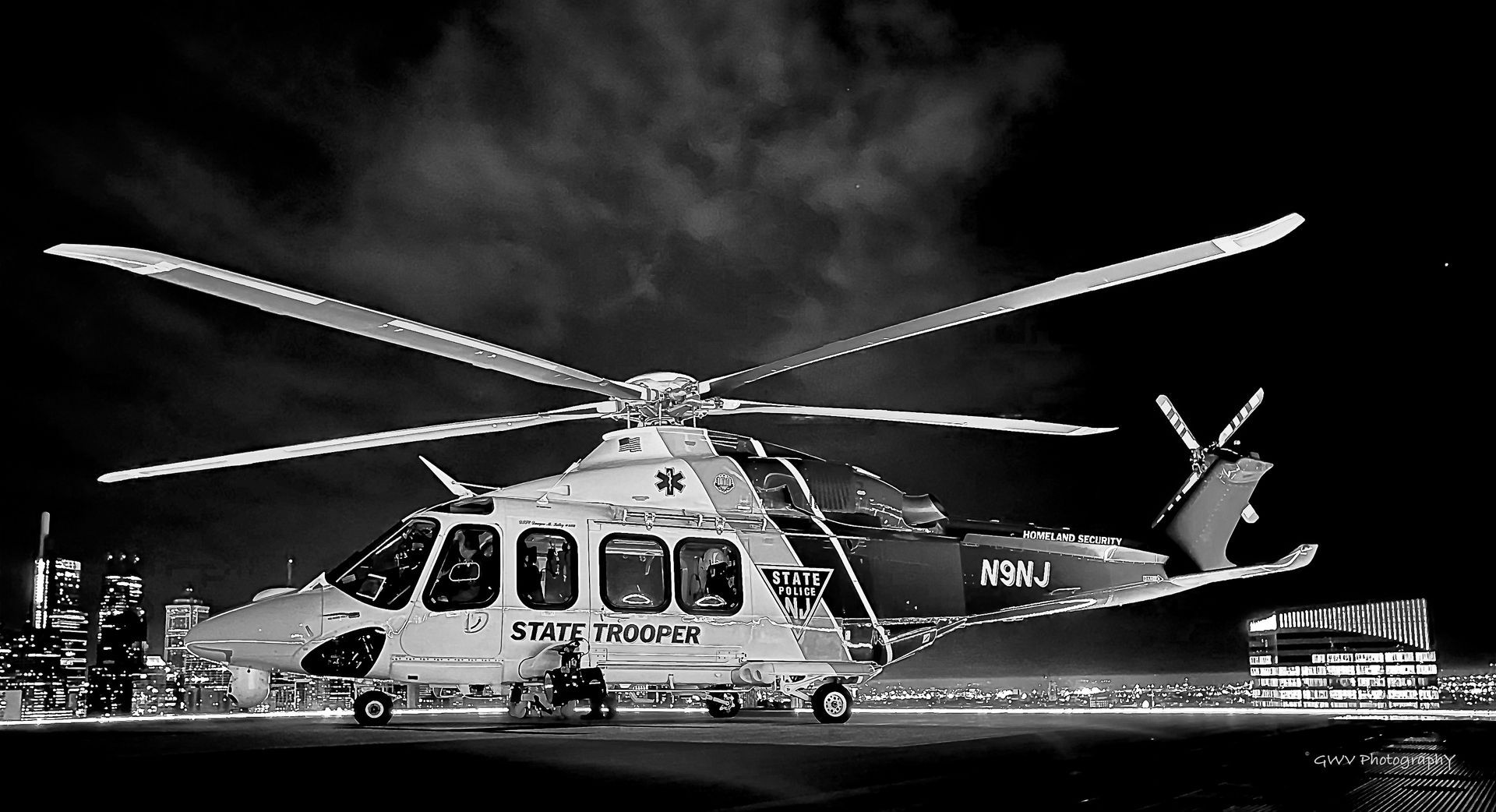 A black and white photo of a rescue helicopter