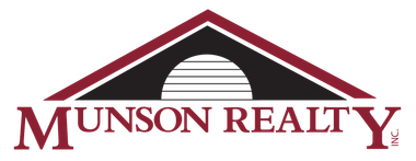 A red and black logo for munson realty