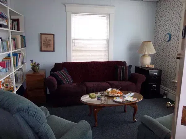 A living room with a couch and a coffee table