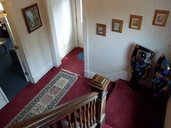 An aerial view of a staircase in a house