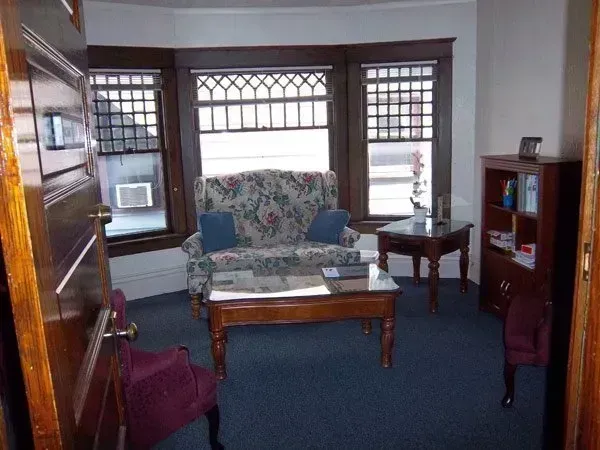 A living room with a couch and a coffee table