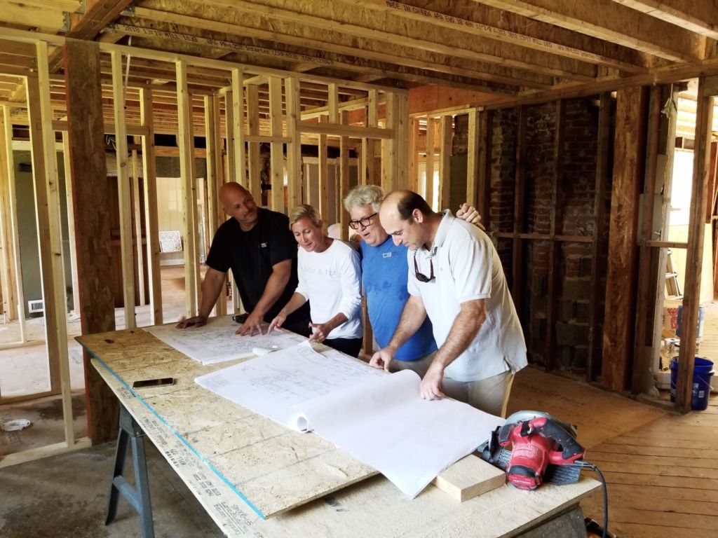 People Looking At Blueprint — Henrico, VA — CB Chandler Construction