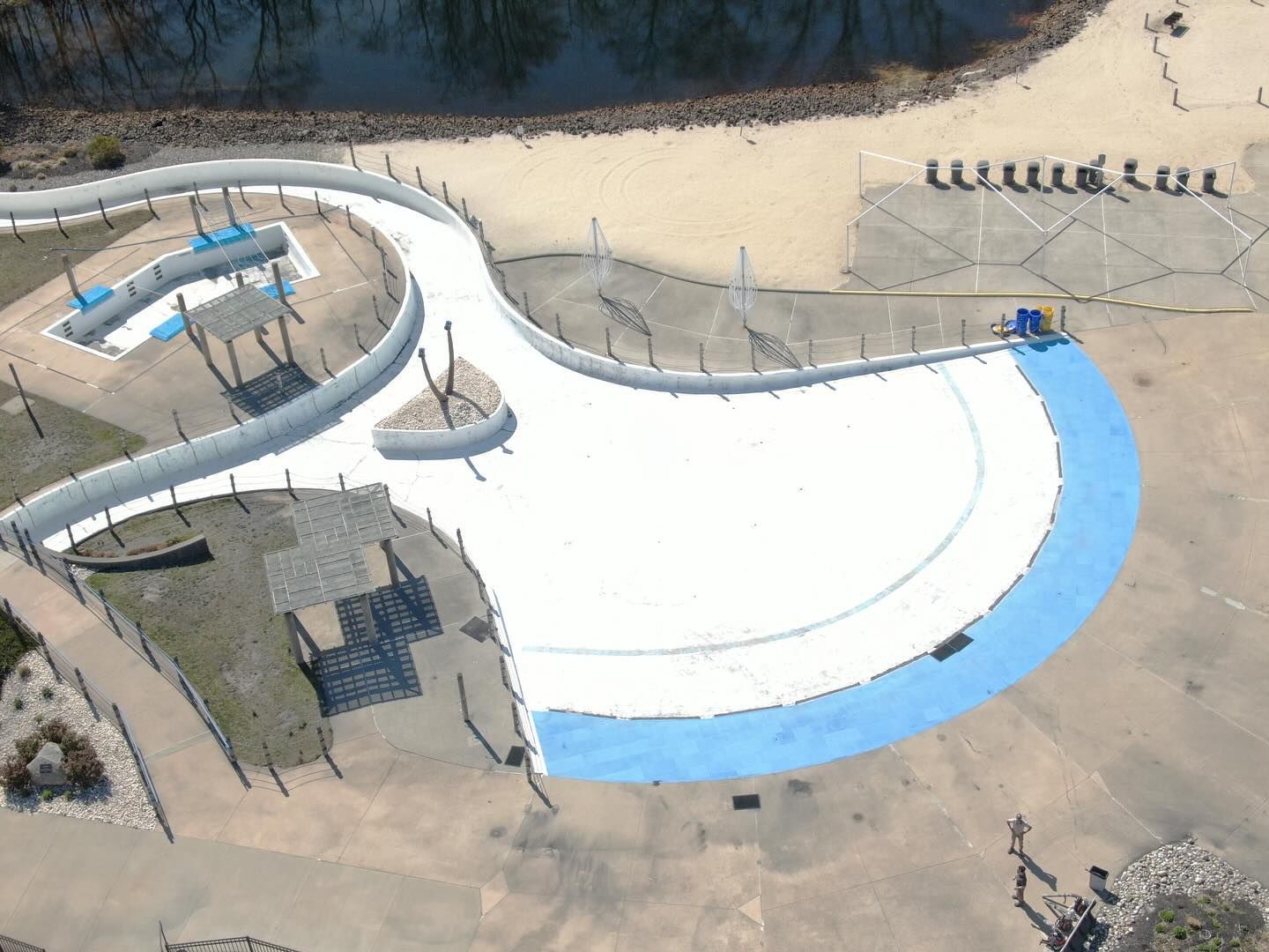 An aerial view of a water slide in a park