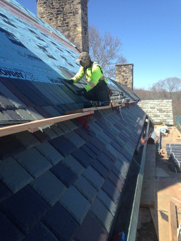Worker Wearing Neon Green | New Milford, CT | Kent Hollow Siding LLC
