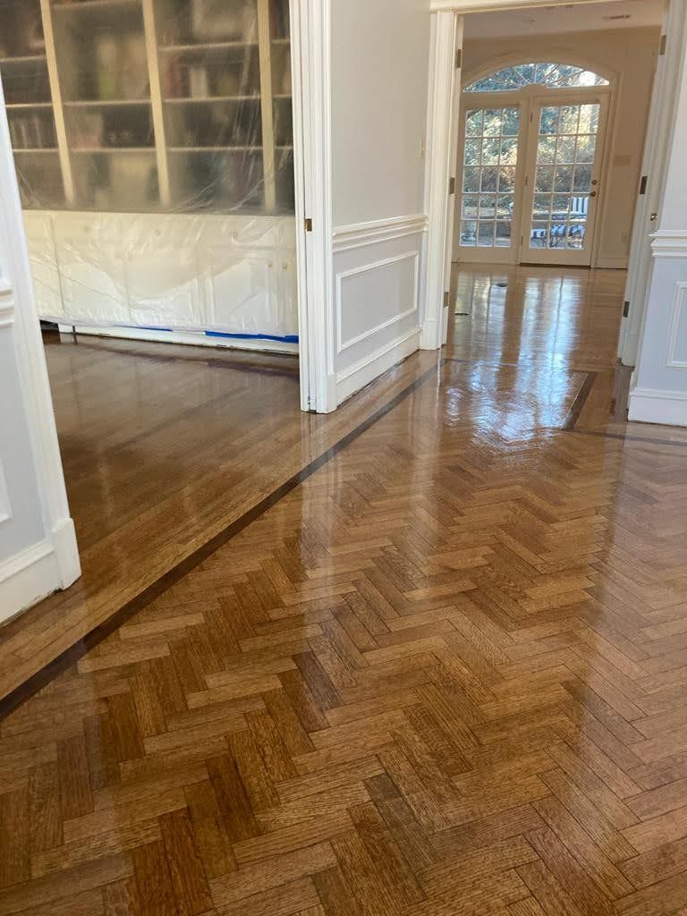 There is a wooden floor in the middle of the room.