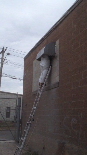 Duct Clean Effects Technician cleaning Commercial Ducts