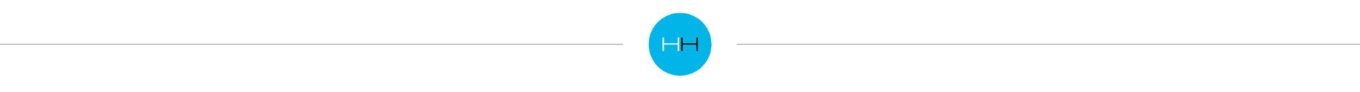 Abstract, blurry, vertical shape with gold and light brown hues against a white background.