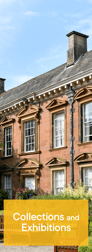 Brick building with white-framed windows, with a yellow box that says 