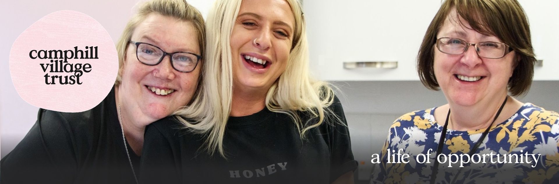 Three smiling women, logo of 