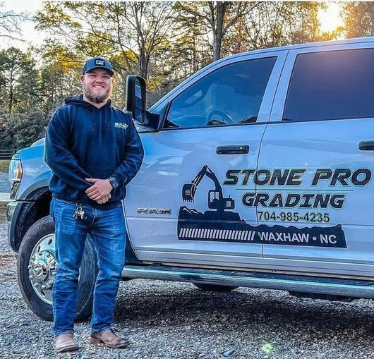 Stone Marcham, owner and founder of Stone Pro Grading, LLC