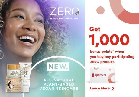 A woman is smiling in an advertisement for a product called zero.