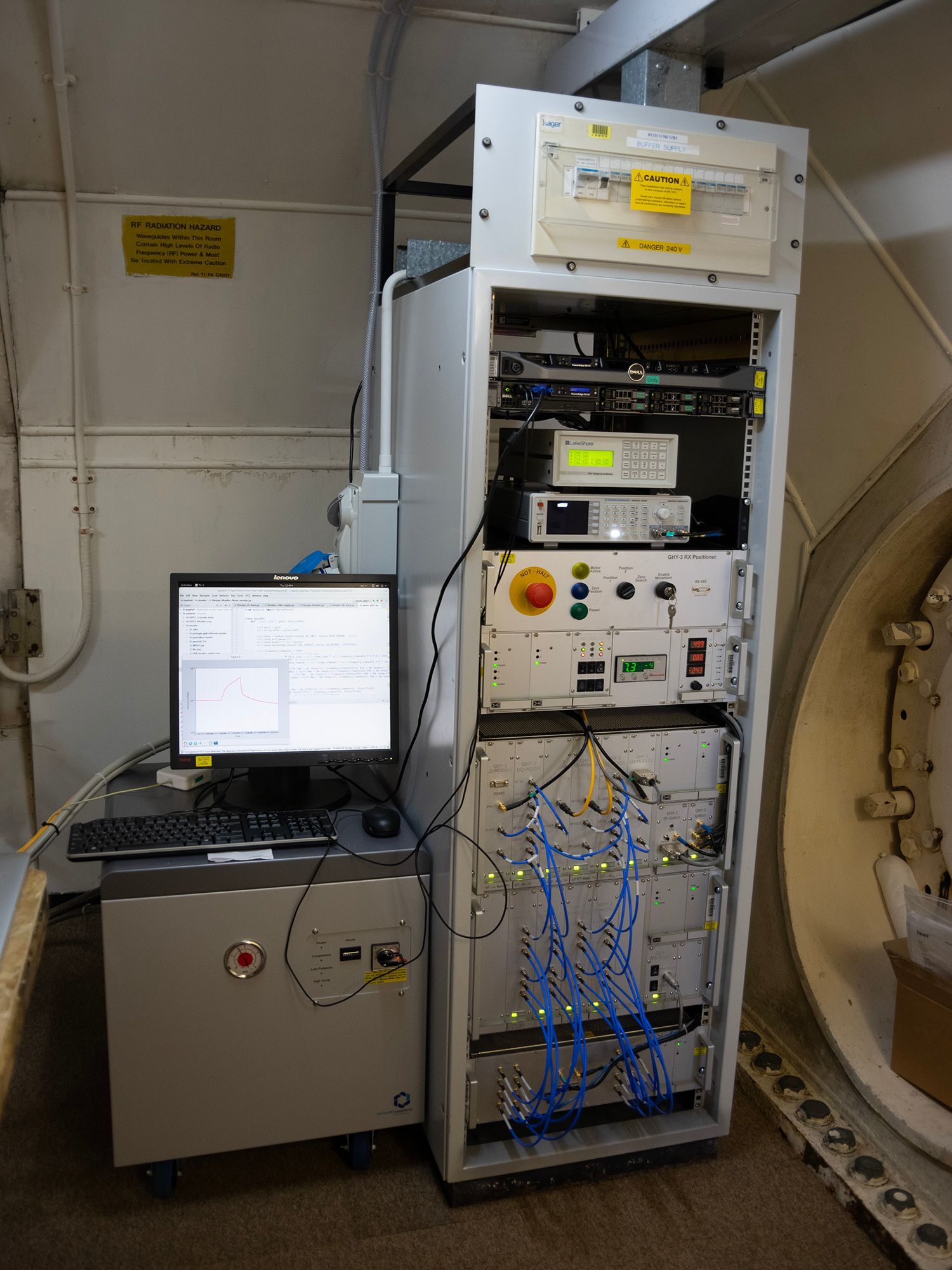 Engineer inspects incoming radio signals