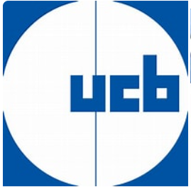 A blue and white logo for ucb in a circle