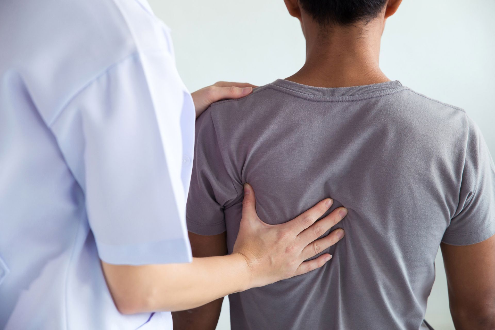 Patient undergoing spinal treatment, highlighting targeted back pain chiropractic care solutions. Patient undergoing spinal treatment, highlighting targeted back pain chiropractic care solutions.