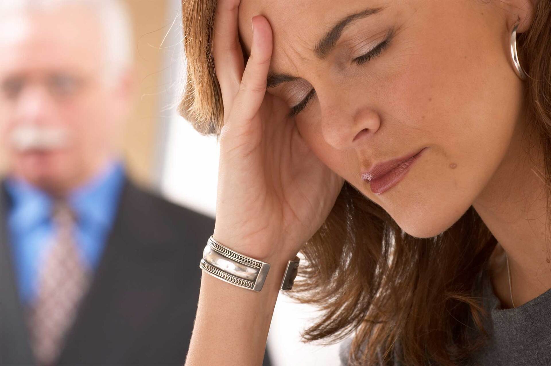 Woman with Headache — Portage, MI — Cornerstone Chiropractic Center