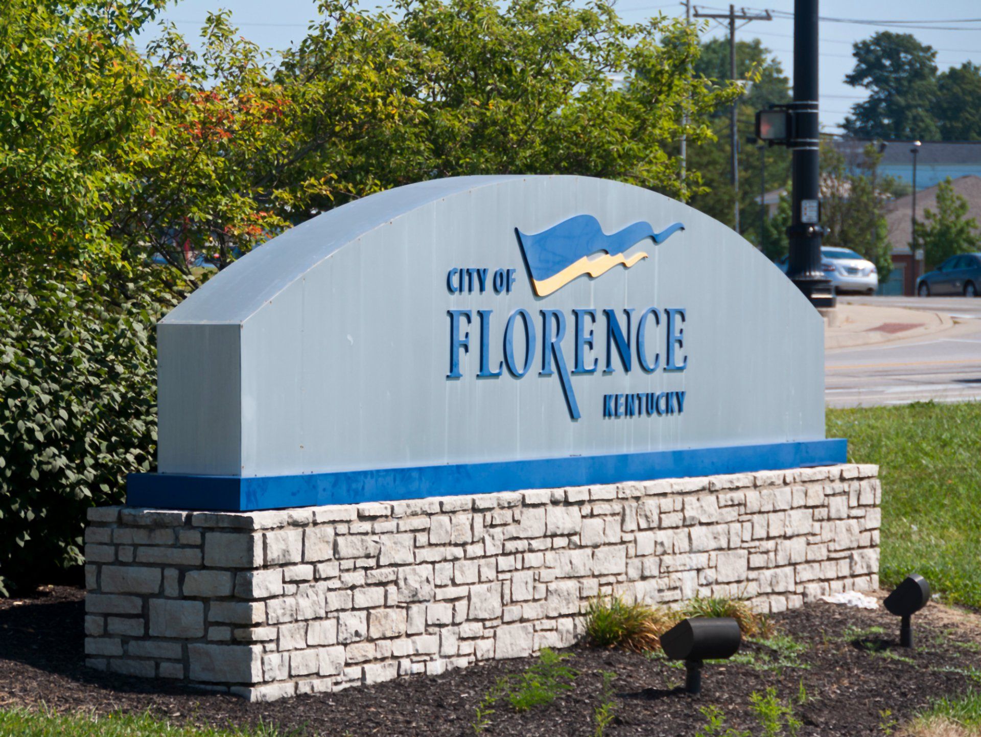 Brick Florence city sign near regional office