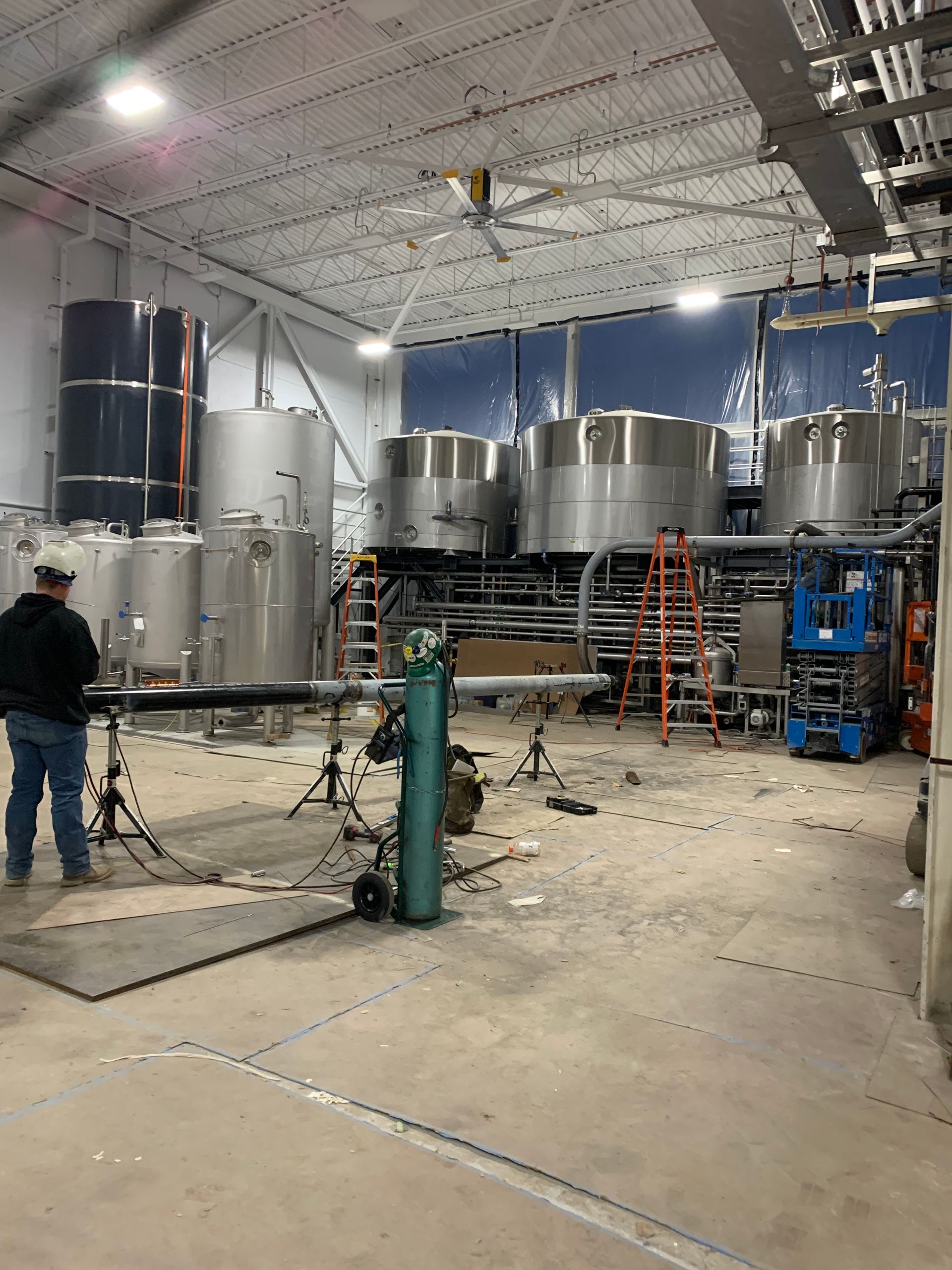 A Worker In An Industrial Building – Savannah, GA – CaM Piping and Welding, LLC