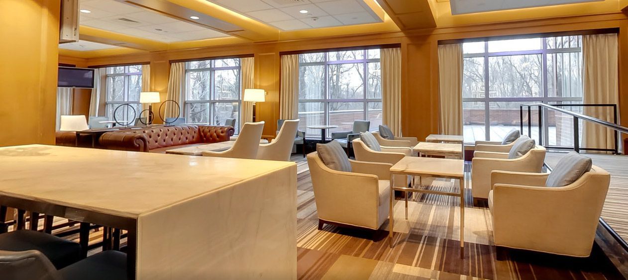 A living room filled with furniture and a table.