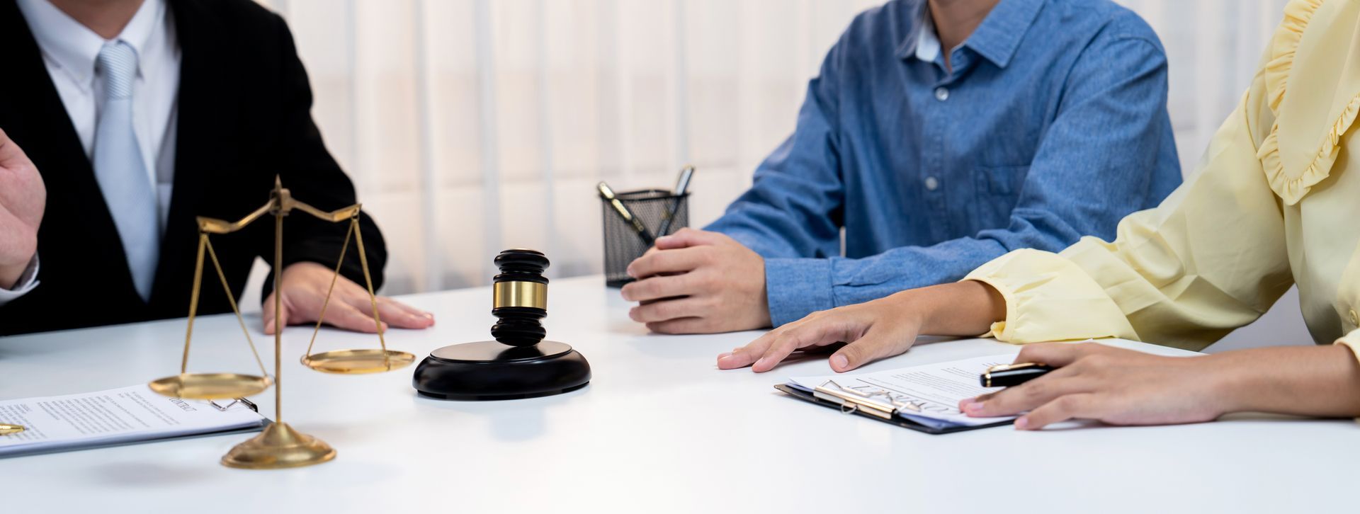 A lawyer acting as a mediator is breaking a compromise between two parties.