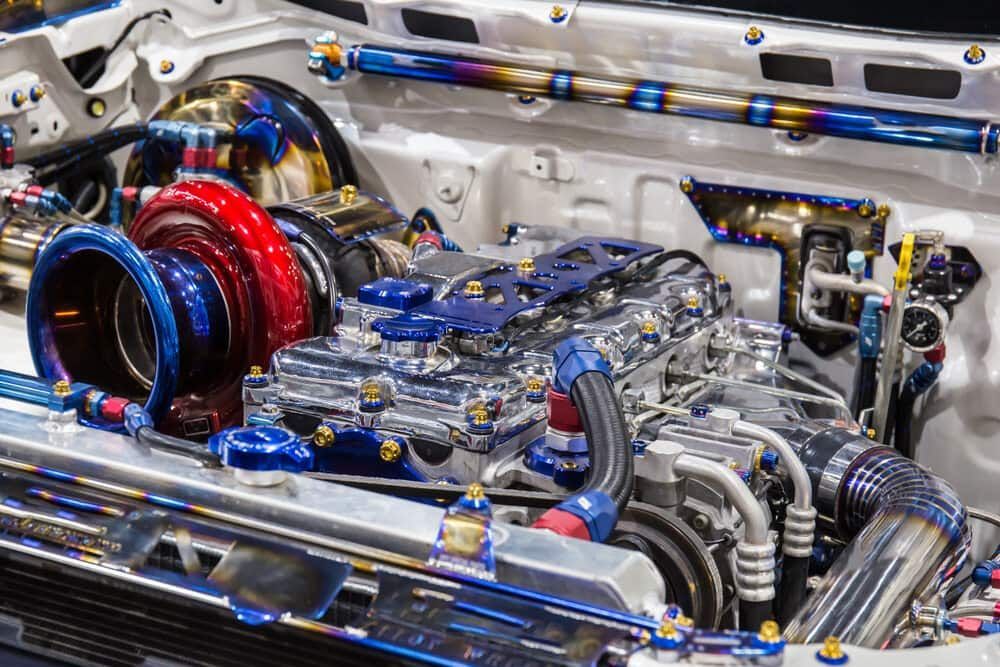A Close up Of a Car Engine with A Turbo — Coast Mechanical Services In Wyong, NSW