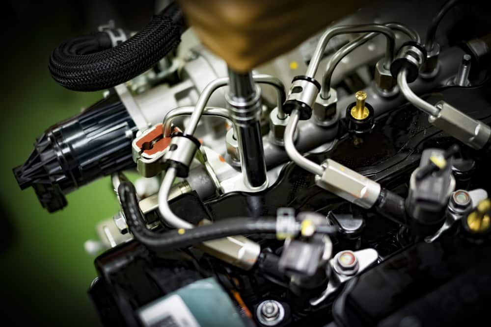 A Close up Of a Car Engine with A Lot of Wires Coming out Of It — Coast Mechanical Services In Morisset, NSW