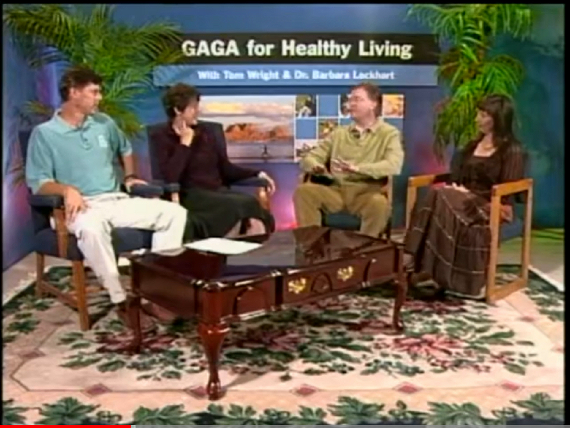 A group of people are sitting around a table talking about gaga for healthy living