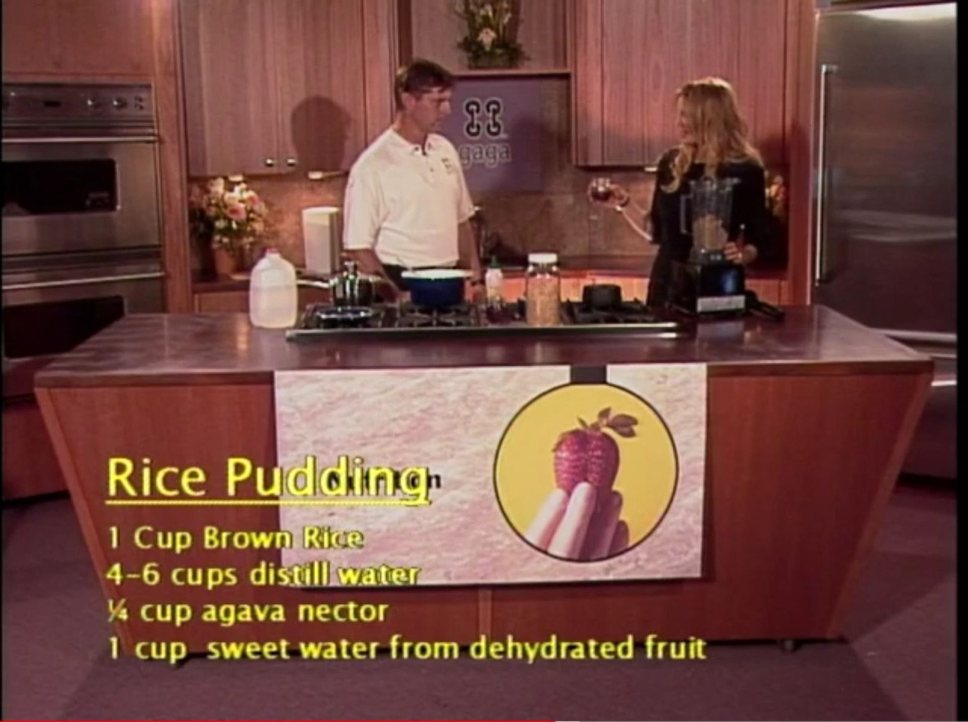 Tom Wright and a woman in a kitchen preparing rice pudding