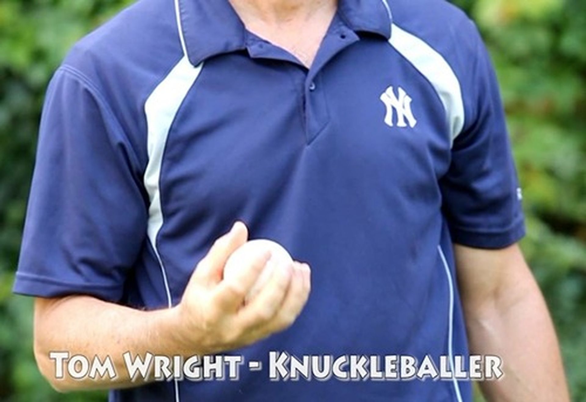 Tom Wright in a NY Yankees shirt is holding a baseball