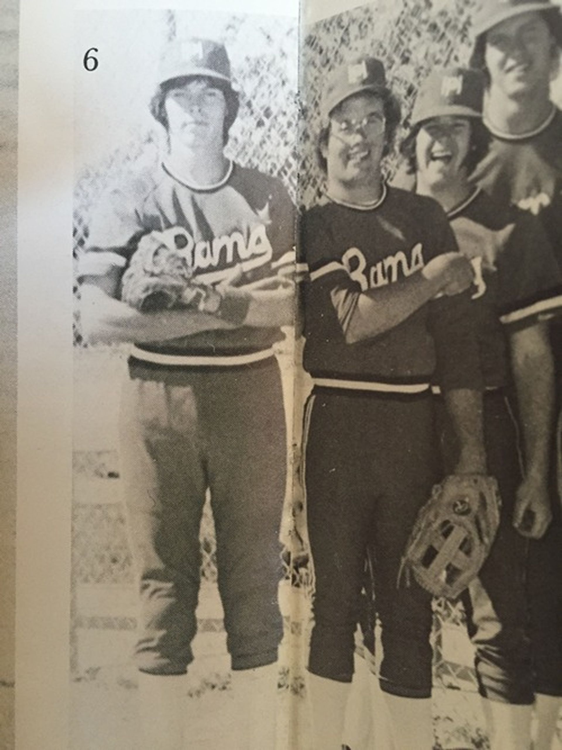 A group of rams baseball players are posing for a photo