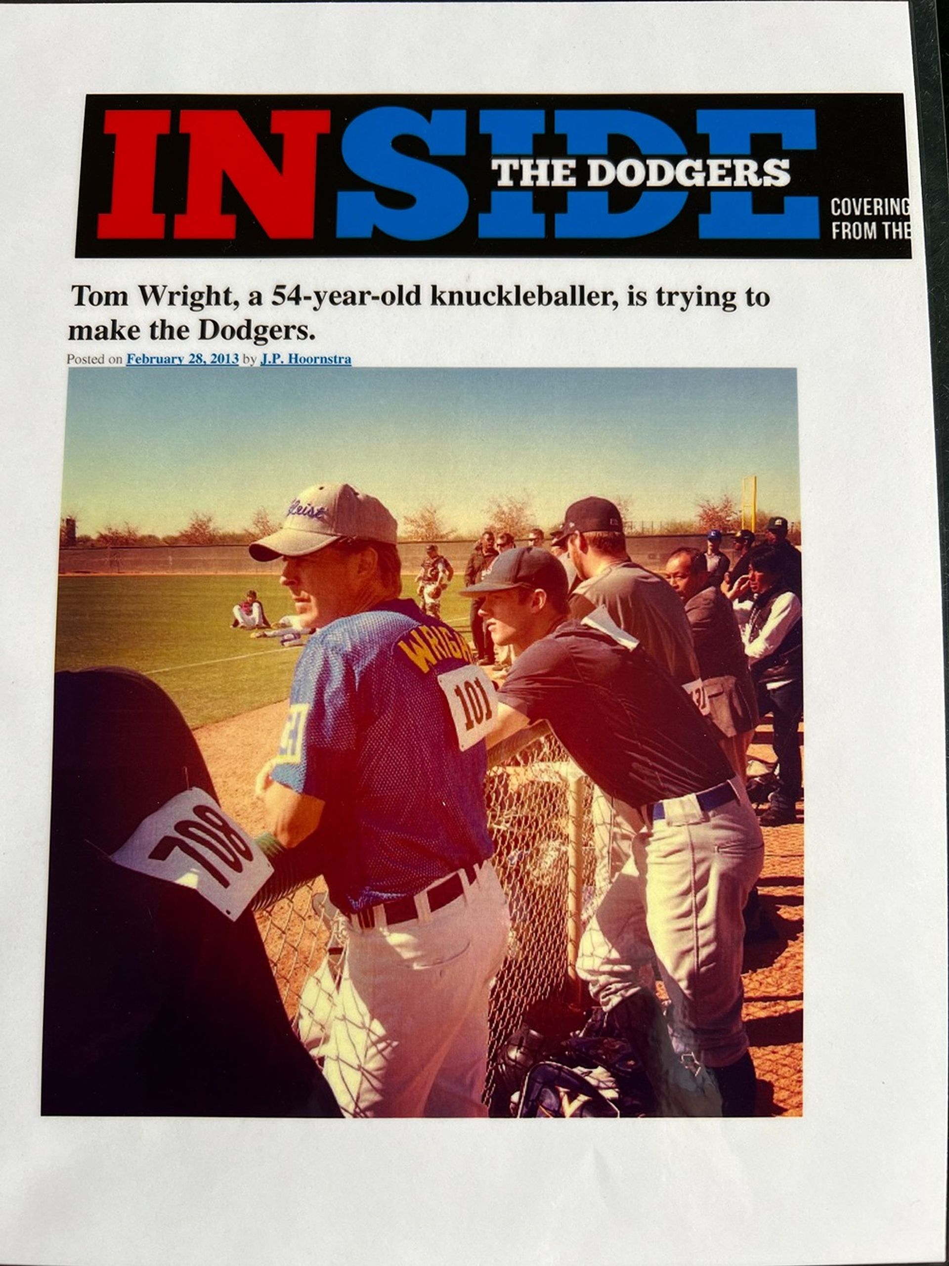 Inside the dodgers magazine with a picture of two baseball players