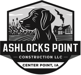 A black and white logo for ashlocks point construction llc