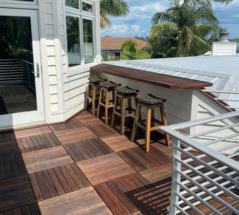 painter staining deck boards transparent protective