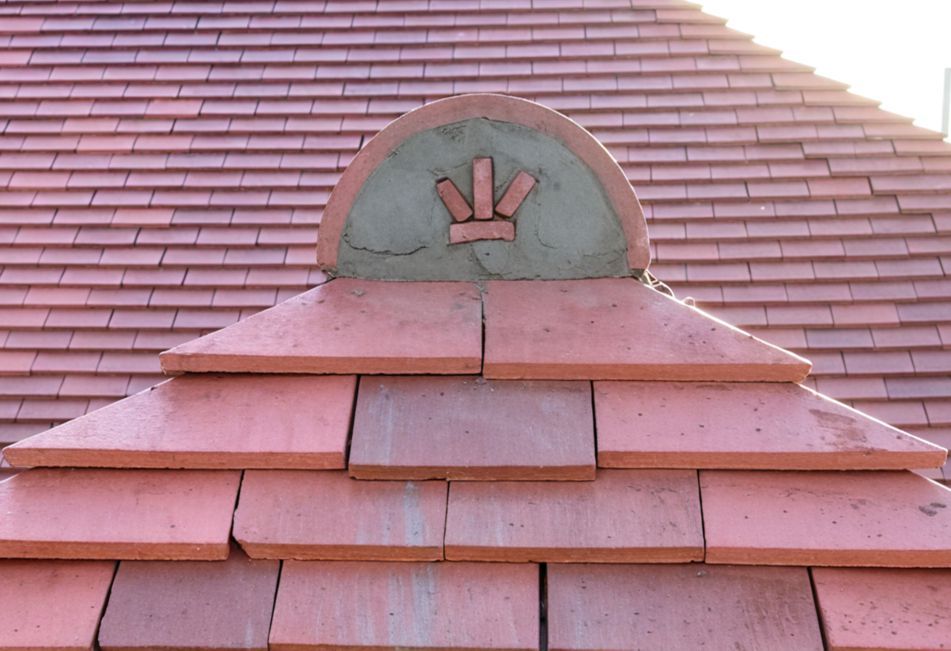 A roof with a crown on top of it
