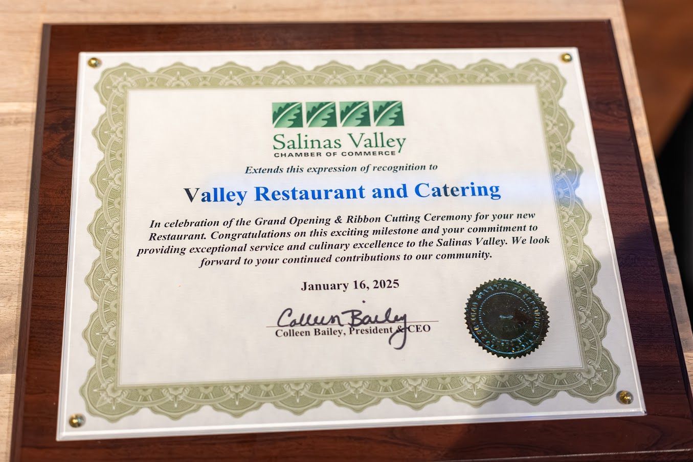 A certificate that says valley restaurant and catering on it