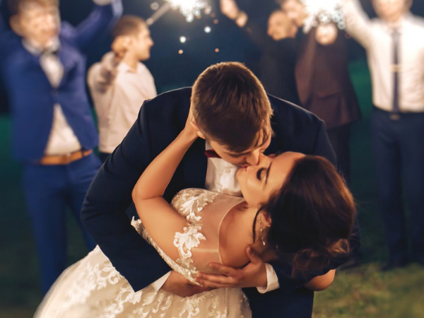 wedding - bride and groom dip with a kiss