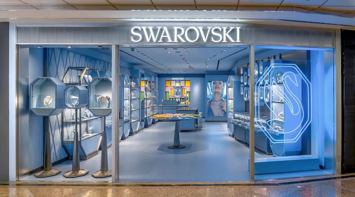 A swarovski store is located in a shopping mall.