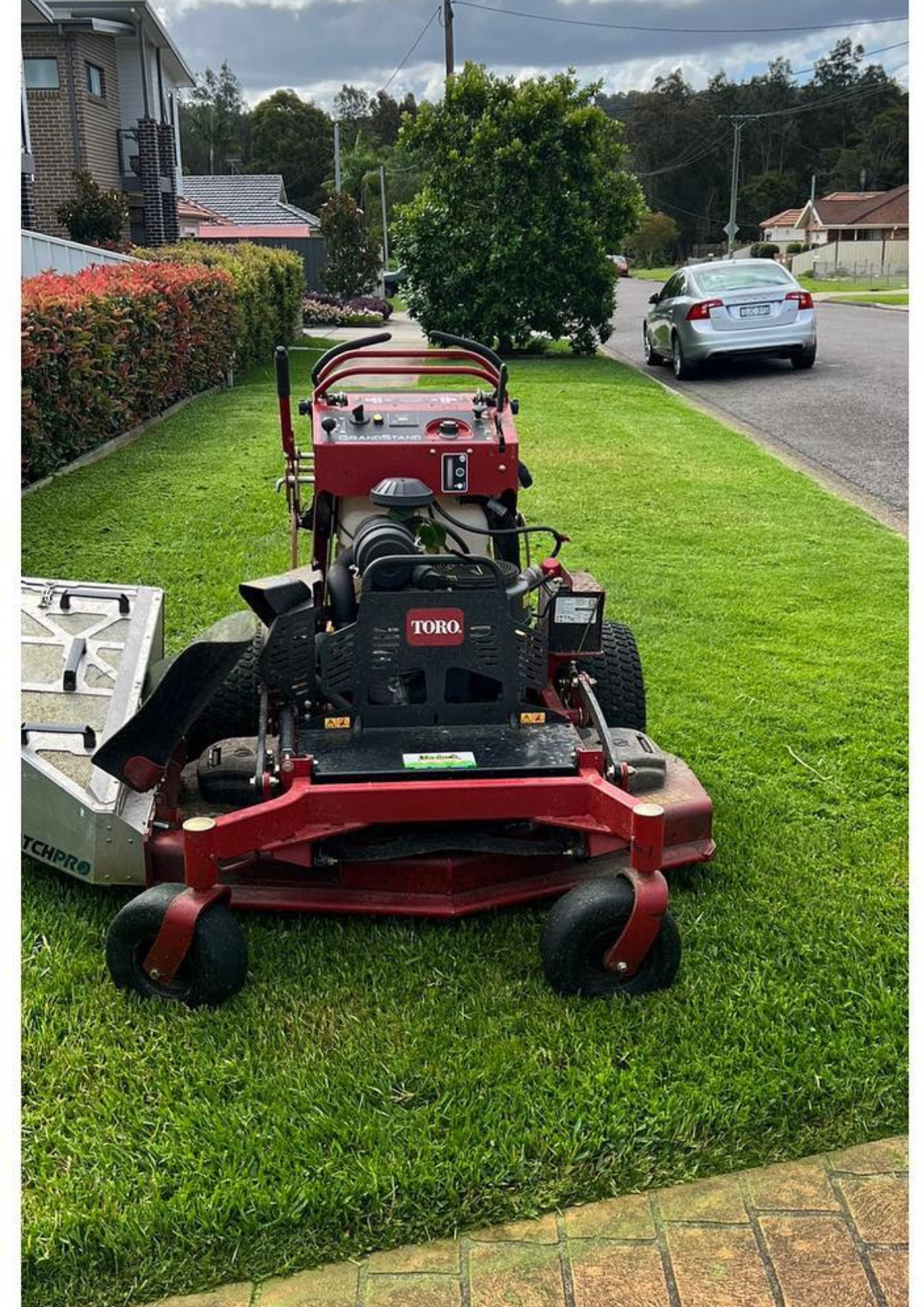 A Park With A Lot Of Grass And Boats In The Background — The Local Bloke Lawn & Garden Care In Cameron Park, NSW