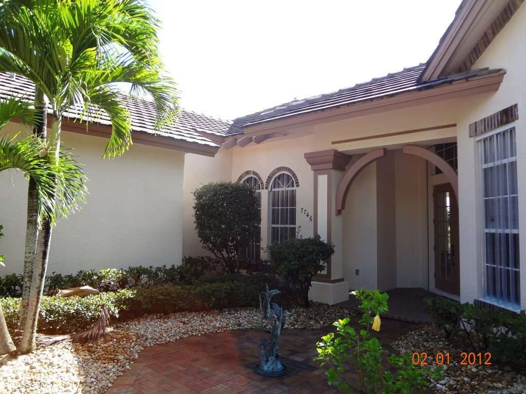 A Picture of a House Taken On February 3 2012 — Naples, FL — Wind Safe Shutters LLC