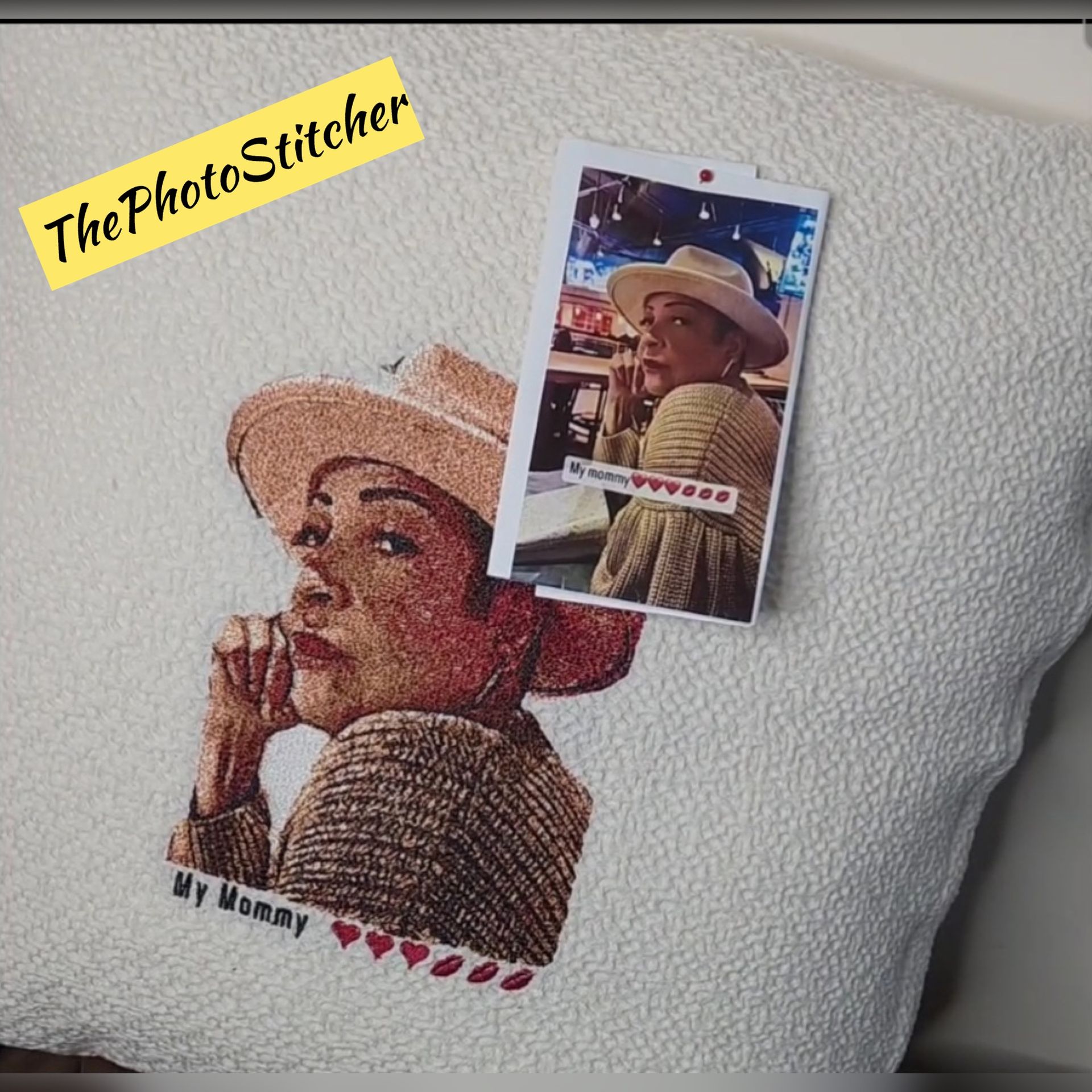 A pillow with a picture of a woman and the words 