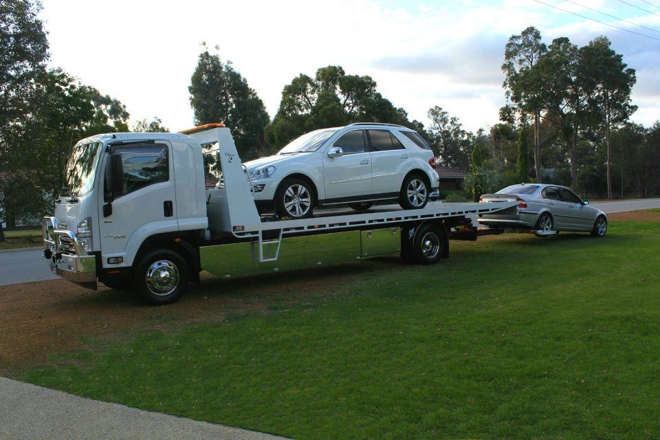 side view of a cars being transported