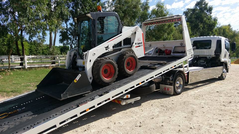 mini excavator being transportation