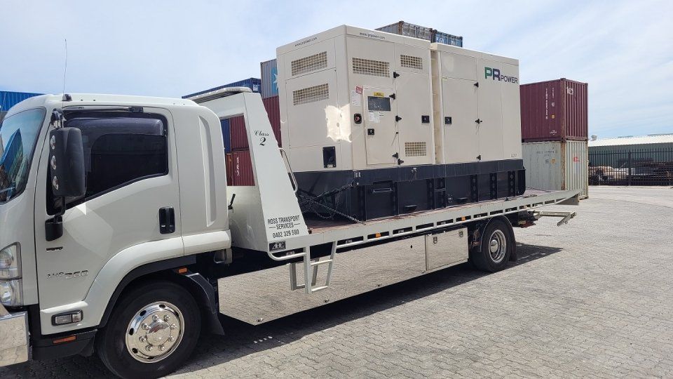 side view of a flat bed transportation truck